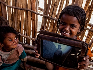 picture of an african girl with a tablet